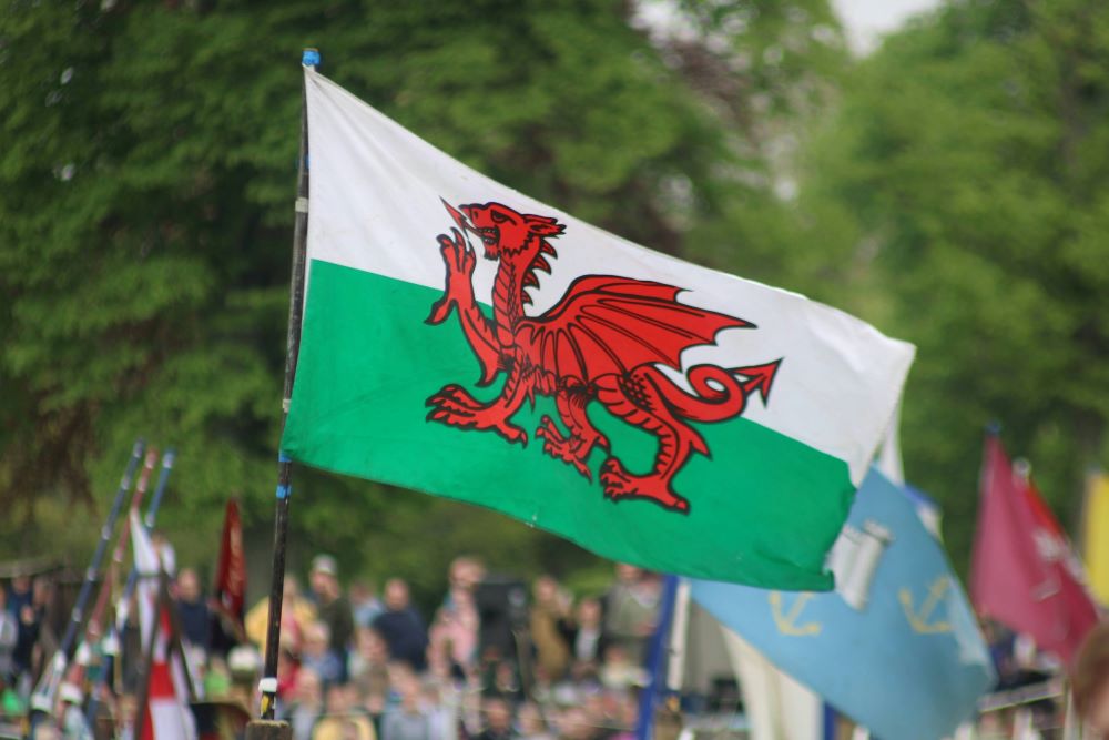 Welsh flag A large wales flag is fluttering in the wind.