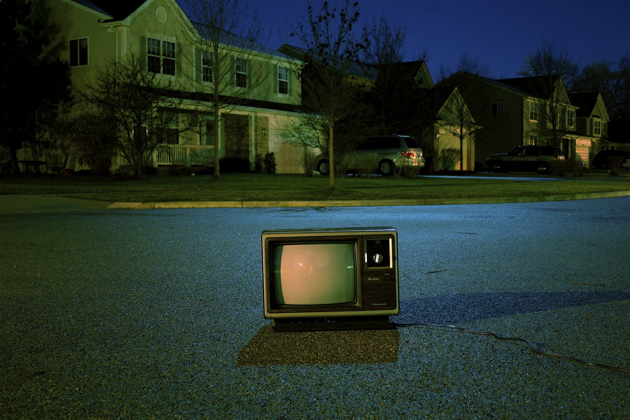 TV on street An image showing an old-school television in the middle of the road